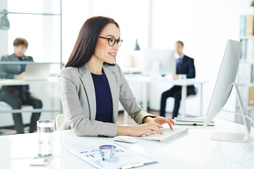 Professional HR manager working on employee management and HR services in a modern office