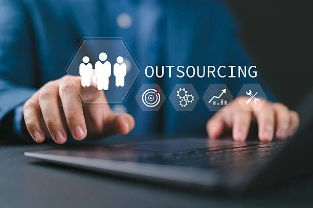 HR outsourcing concept showing business professionals using digital technology to manage outsourced HR services